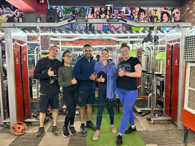 Group of gym members and coaches