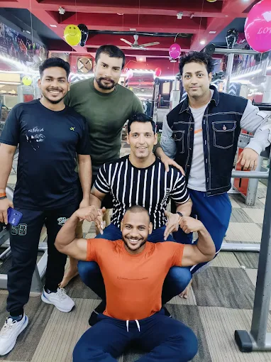 Group of male members posing together